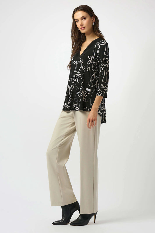 Silky Knit Face Print Flared Top