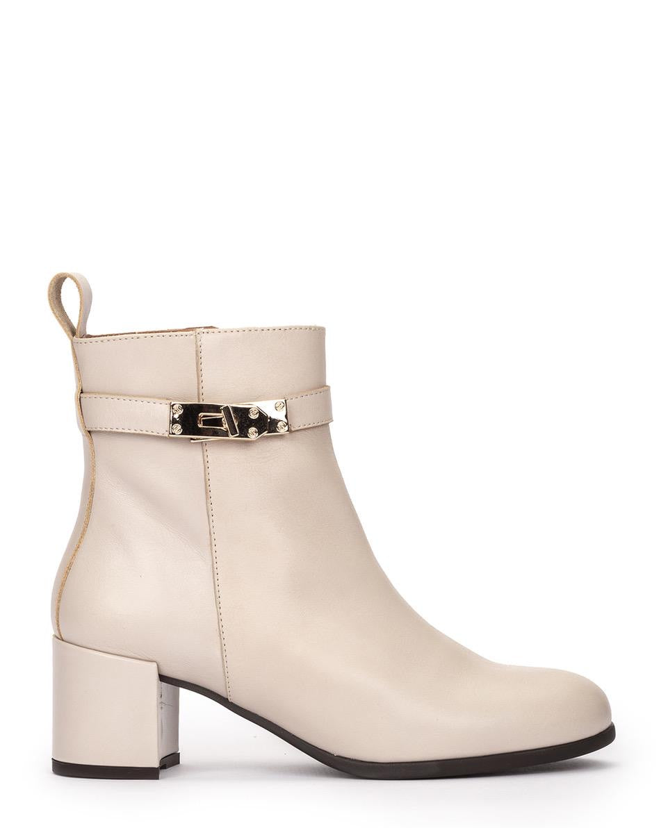 Beige ankle boot with a gold buckle
