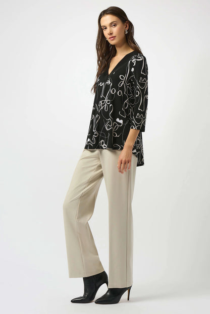 Silky Knit Face Print Flared Top