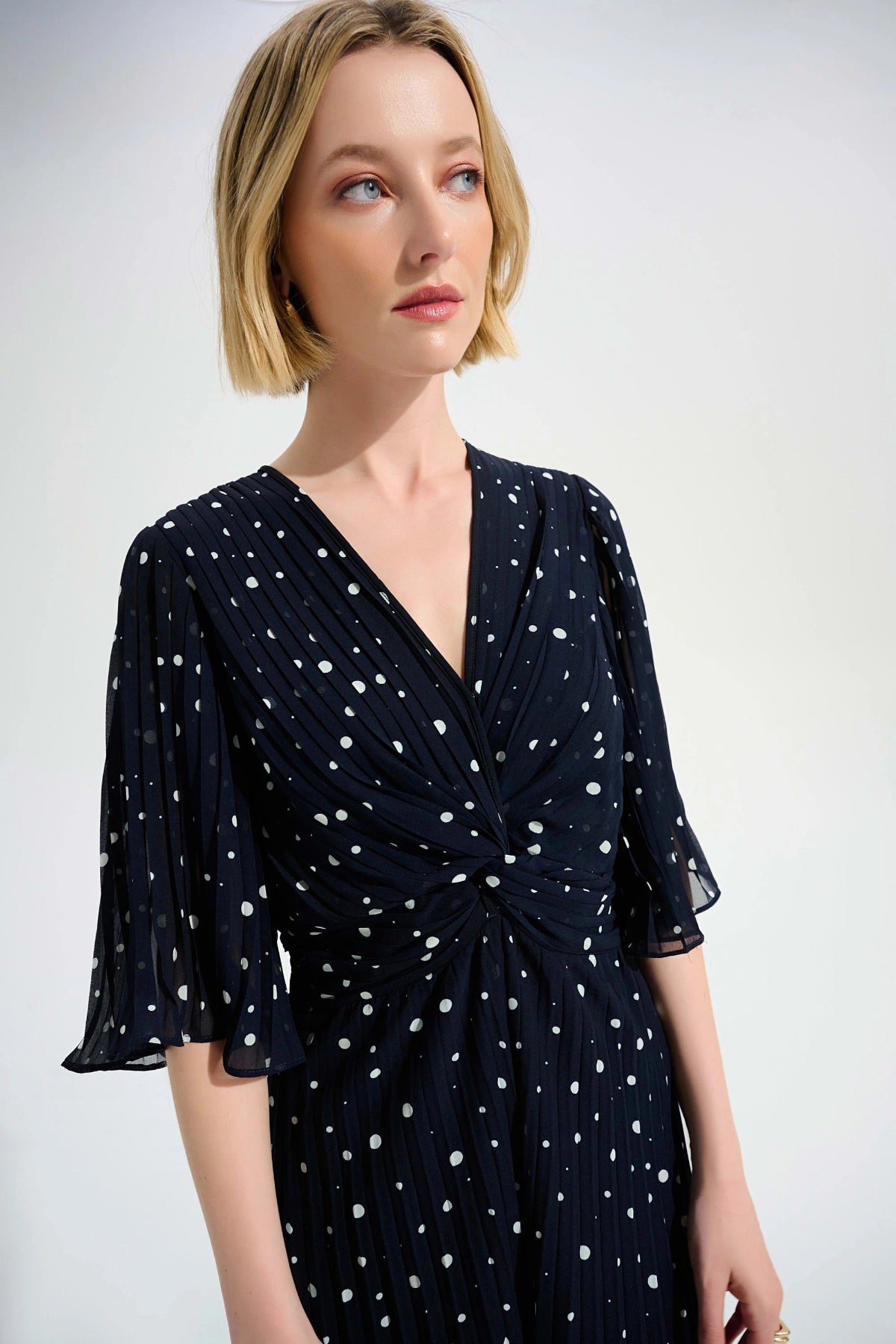 Joseph Ribkoff Pleated Chiffon Dot Print Wide Leg Jumpsuit With Knot Detail