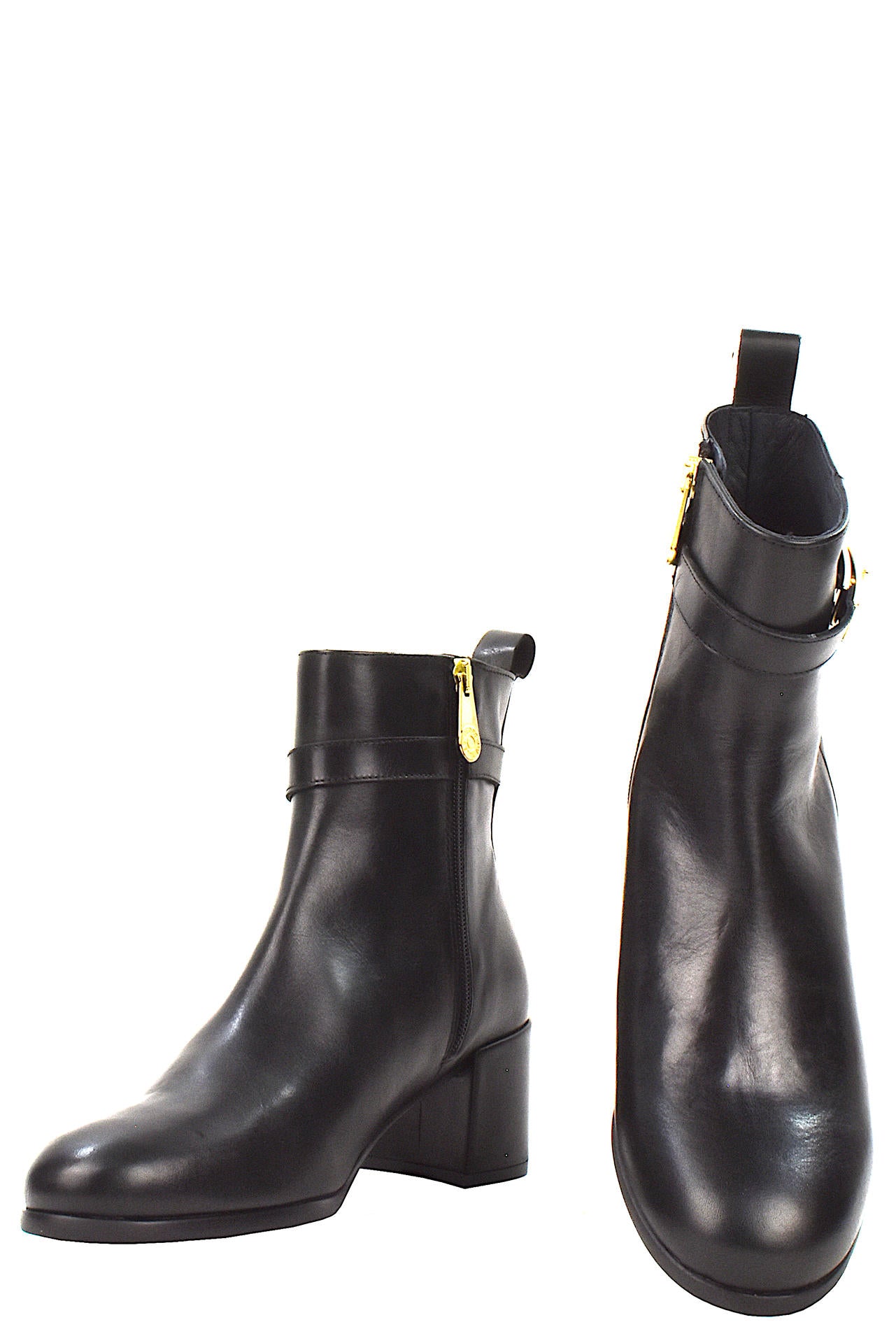 Beige ankle boot with a gold buckle 