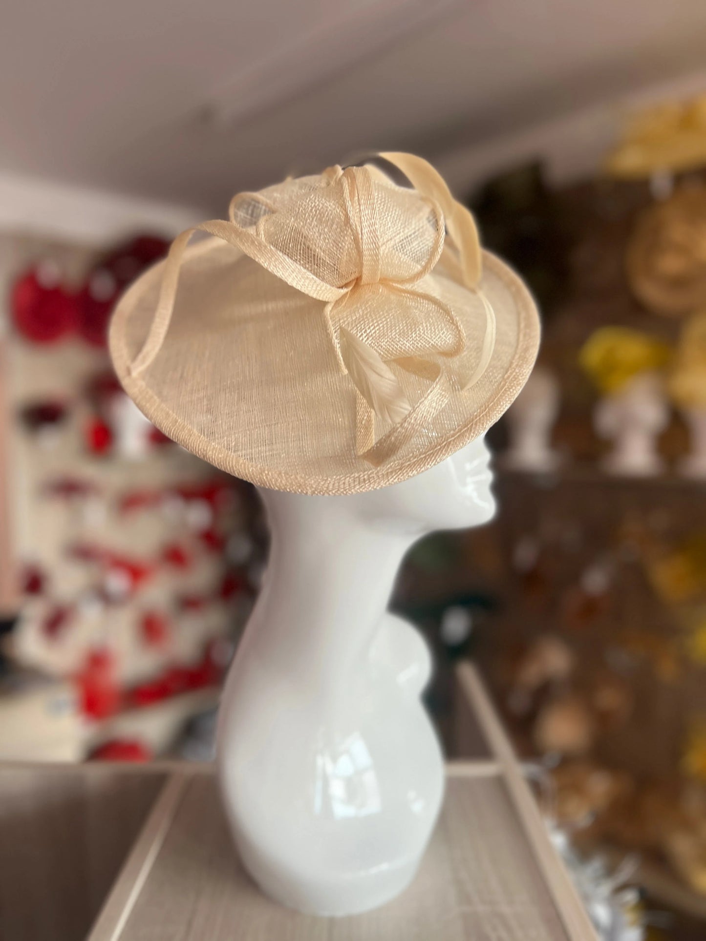 Sinamay Hatinator with Bow and Quill available in Gold
